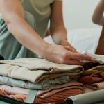Woman stows clothes by GrlTalk.com