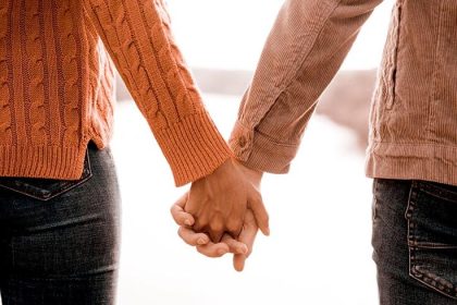 A couple holding hands