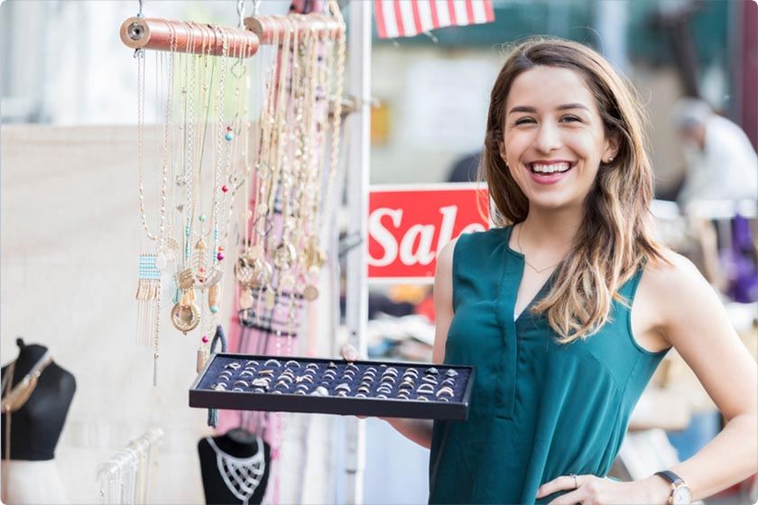 A woman in a local market will sell jewelry