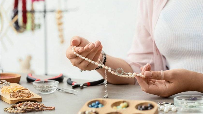 A woman is going to perform the best way to sell jewelry